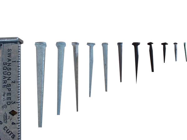 There are several cut masonry nails with different sizes.